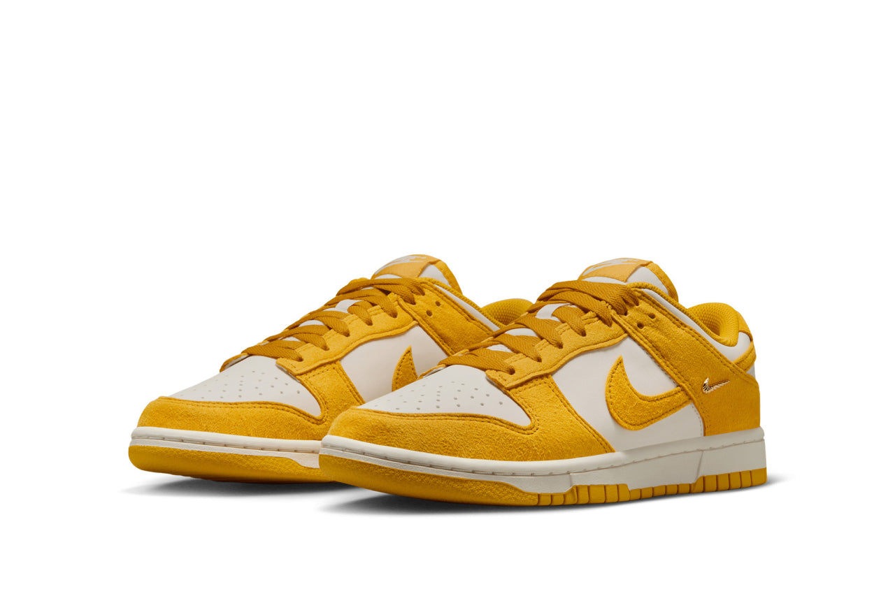 Nike Women Dunk Low "Gold Mini Swoosh"